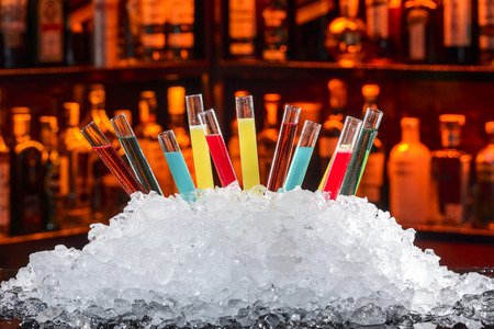 colorful cocktails in a test tubeの写真素材