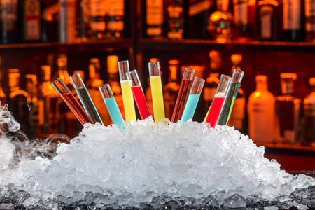 colorful cocktails in a test tubeの写真素材