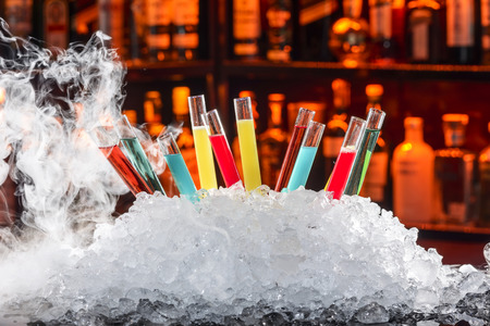 colorful cocktails in a test tubeの写真素材