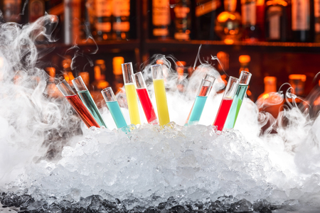 colorful cocktails in a test tubeの写真素材