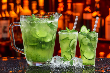 fresh summer coctail in ice by cucumberの写真素材