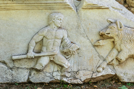 Famous ruin landmark in the Aphrodisias amphitheater in Turkey. Green spring landscape.