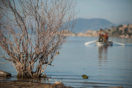 Lake Bafa Nature Park in Turkey, near Aegean Sea. Ancient Greek city Heraclea ruins can be seen all...