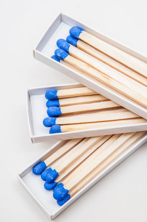 a pile of blue-tipped matches