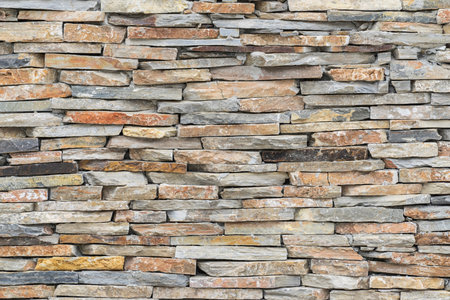 Black slate wall texture and background, stone wall