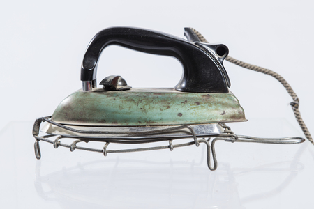 A close up of an antique iron. Isolated backgroundの写真素材