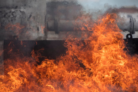 Burning fire and smoke in the factory, closeup of photo