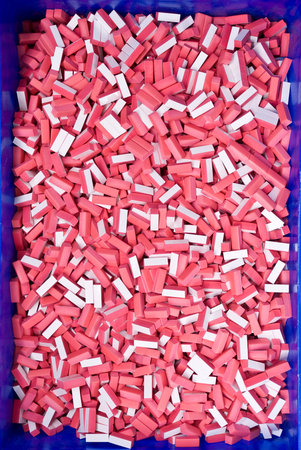 Pile of red and white building blocks for background or texture.