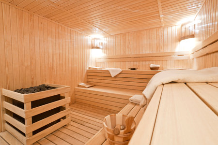 Interior of a wooden sauna in a finnish spaの写真素材