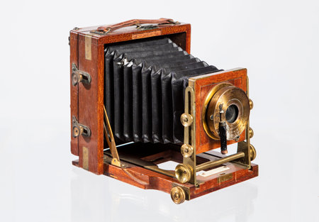 Antique camera on a white background, isolated, close-up
