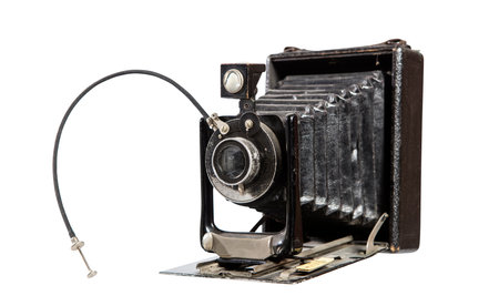 Old camera on a white background, isolated object, close-up