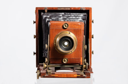Vintage photo camera isolated on white background. Old camera on a white background.