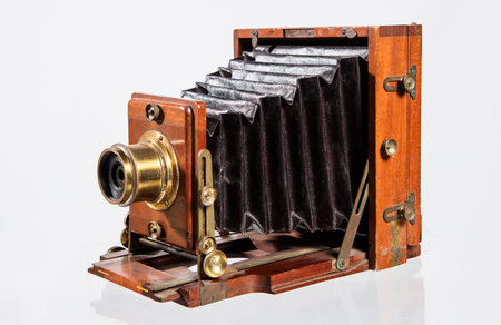 Vintage photo camera on a white background, close-up.の写真素材