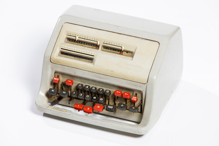 Old typewriter on a white background, isolated, close-upの写真素材
