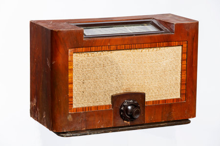Vintage radio on a white background, closeup of photo.の写真素材