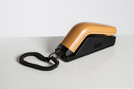Close-up of a cordless telephone on a white background.の写真素材