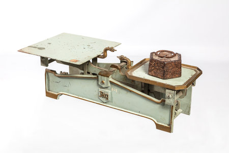 Antique scale isolated on a white background, clipping path included.の写真素材
