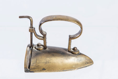 Vintage iron isolated on a white background. Selective focus.の写真素材