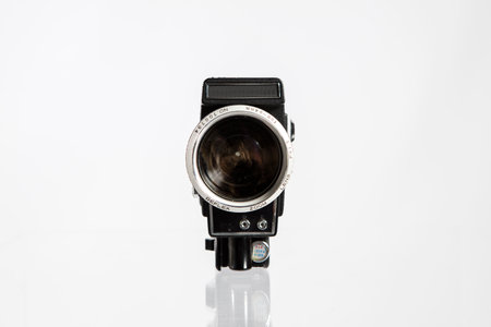 Retro camera isolated on a white background with reflection and clipping pathの写真素材