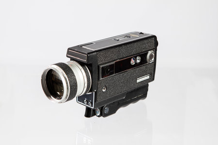 Vintage camera on white background. Isolated object with reflection.の写真素材