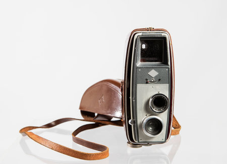 Vintage camera isolated on a white background, closeup of photoの写真素材