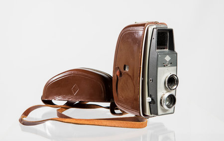 Vintage camera isolated on white background with reflection and clipping path.の写真素材