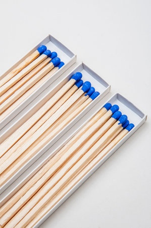 Matches in a white box on a white background, close-upの写真素材