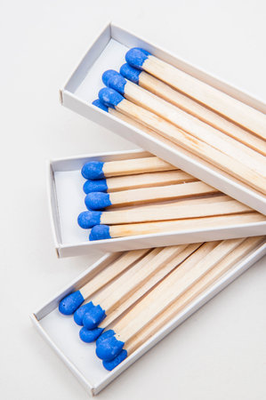 Wooden matches in a white box on a white background closeupの写真素材