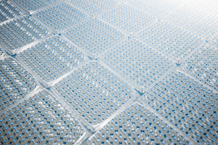 Plastic bottles with water in the hydroponic farm, stock photo