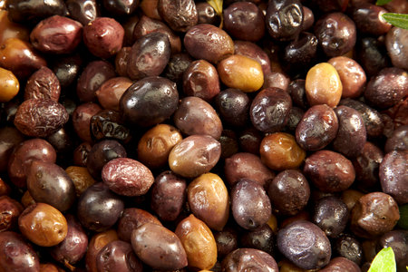olives on a wooden table, olives background, olives backgroundの写真素材