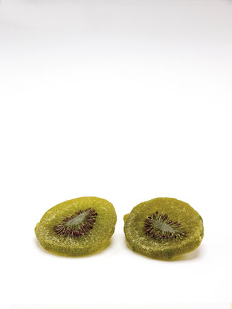 Dried kiwi fruit on white background. isolatedの写真素材