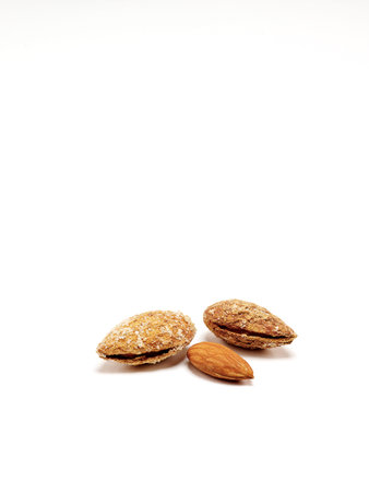 Almond nuts isolated on white background. Healthy food and nutrition.