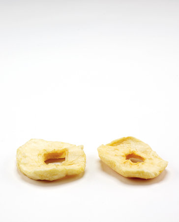 Pineapple chips isolated on a white background. Dried pineapple chips.の写真素材