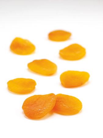 Dried apricots isolated on white background. Healthy food.の写真素材