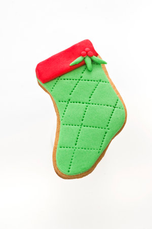 Christmas gingerbread cookies on a white background, closeup of photoの写真素材