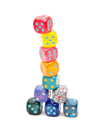 Colorful dice isolated on a white background. Close-up.の写真素材