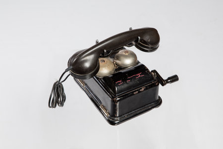 Old telephone on a white background, old telephone on a white backgroundの写真素材