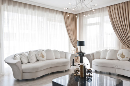 luxury and fashionable living room interior design with white sofa and lampの写真素材