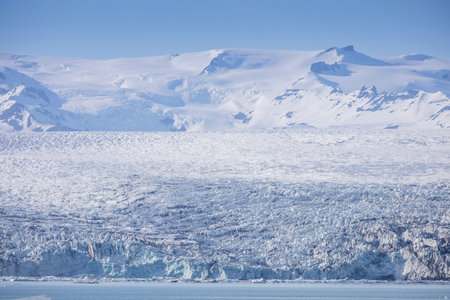 Big pieces of ice (floe) from glacier in the lake, ice islands, glacier and mountains,...