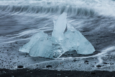 Big pieces of ice (floe) from glacier in the lake, ice islands, glacier and mountains,...