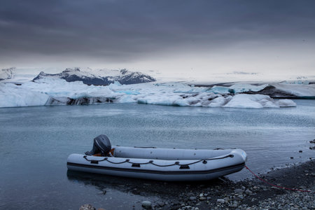 Boat in Glacier Lagoon, Ilulissat, Greenlandの写真素材