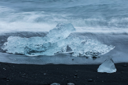 Big pieces of ice (floe) from glacier in the lake, ice islands, glacier and mountains,...