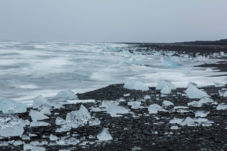 Big pieces of ice (floe) from glacier in the lake, ice islands, glacier and mountains,...