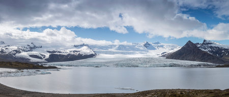 Fjallsarlon glacier lagoon flowing down from Vatnajokull glacier located in south Iceland
