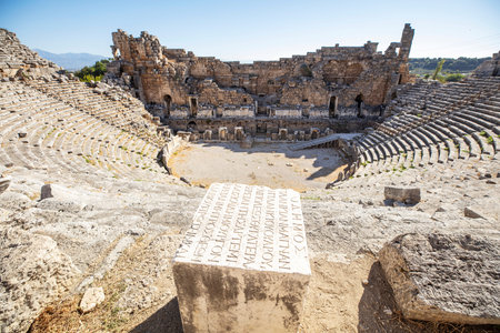 Nymphaeum of Perge. Ruins of ancient Pamphylian city located in Antalya Province, Turkey. Statue of...