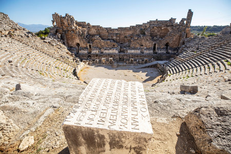 Nymphaeum of Perge. Ruins of ancient Pamphylian city located in Antalya Province, Turkey. Statue of...