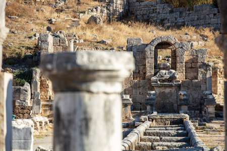 Nymphaeum of Perge. Ruins of ancient Pamphylian city located in Antalya Province, Turkey. Statue of Kestros, river god.の写真素材