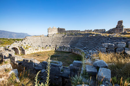 Xanthos Ancient City. Grave monument and the ruins of ancient city of Xanthos - Letoon in Kas, Antalya, Turkey at sunset. Capital of Lycia.の写真素材