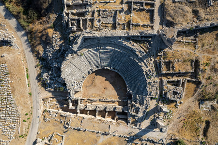 Xanthos Ancient City. Grave monument and the ruins of ancient city of Xanthos - Letoon in Kas, Antalya, Turkey at sunset. Capital of Lycia.の写真素材