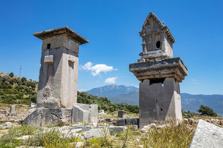 Xanthos Ancient City. Grave monument and the ruins of ancient city of Xanthos - Letoon in Kas, Antalya, Turkey at sunset. Capital of Lycia.の写真素材